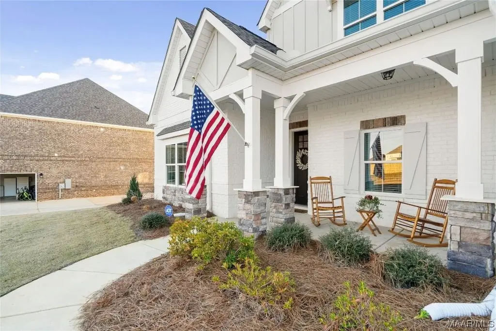 A wide shot picture of a house from the outside.